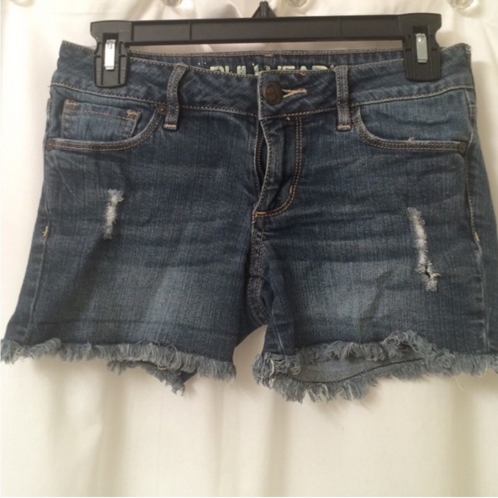 Distressed bullhead shorts